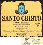 Etiketa Santo Cristo 1999 Denominación de Origen (DO) (Crianza) - Crianzas y Viñedos Santo Cristo S. Coop. Ainzon, Campo de Borja, Španělsko.