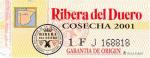 Etiketa na zadní straně láhve - označení denominace organizace španělských vinařů a vín INDO (Instituto Nacional de Denominaciones de Origen).