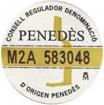 Etiketa na hrdle láhve označení denominace organizace španělských vinařů a vín INDO (Instituto Nacional de Denominaciones de Origen).
